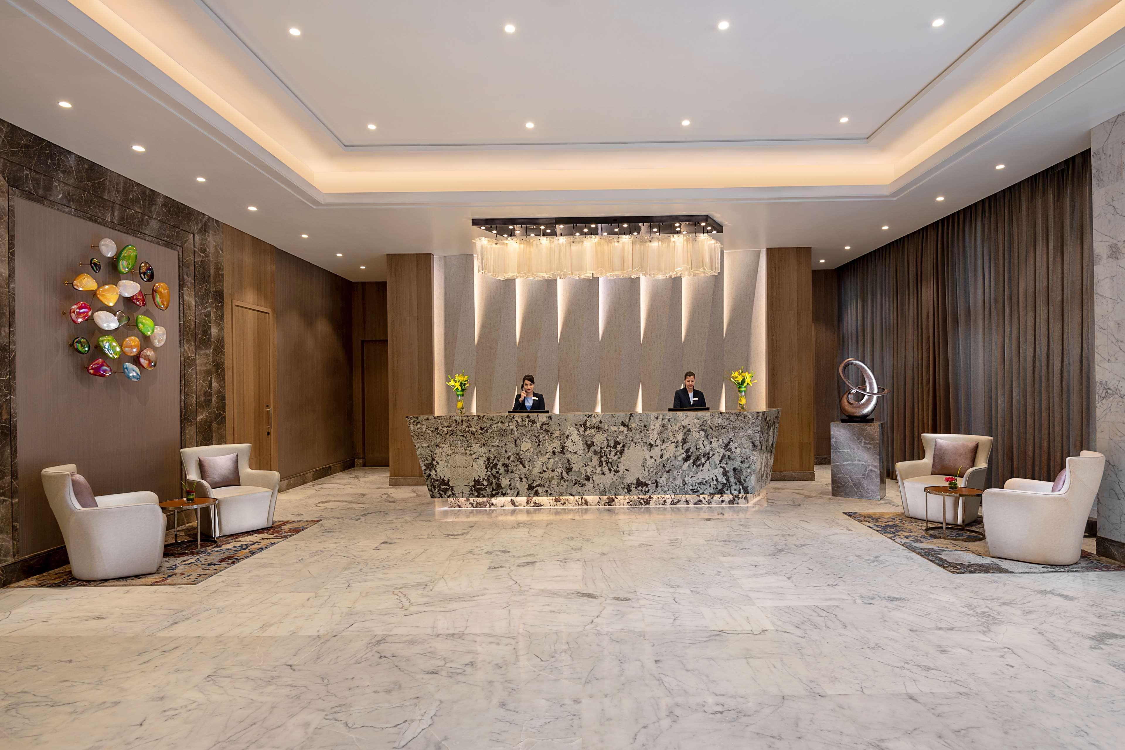 Radisson Mumbai Andheri Midc Exteriör bild The lobby of the hotel